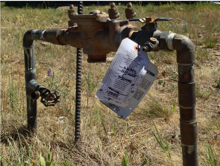 Backflow prevention device in the outdoors